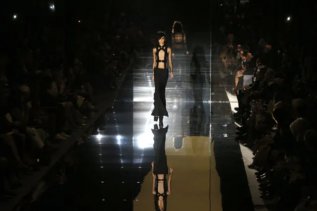 A model presents a creation from the Tom Ford Spring/Summer 2015 collection during London Fashion Week  September 15, 2014. (Photo by Suzanne Plunkett/Reuters)