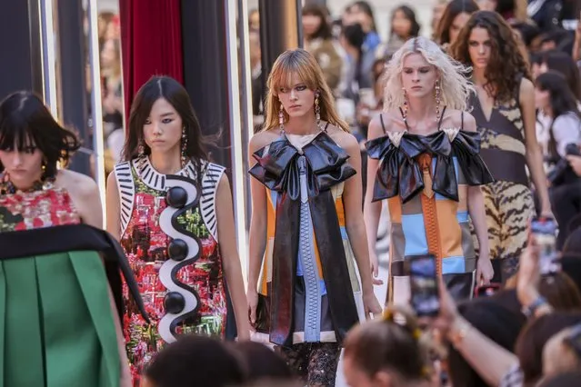 Models wear creations for the Louis Vuitton ready-to-wear Spring/Summer 2023 fashion collection presented Tuesday, October 4, 2022 in Paris. (Photo by Vianney Le Caer/Invision/AP Photo)