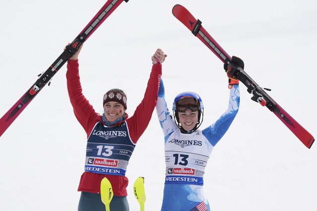 United States' Breezy Johnson, left, and teammate United States' Mikaela Shiffrin celebrate winning the gold medal in a women's team combined event, at the Alpine Ski World Championships, in Saalbach-Hinterglemm, Austria, Tuesday, February 11, 2025. (Photo by Giovanni Auletta/AP Photo)