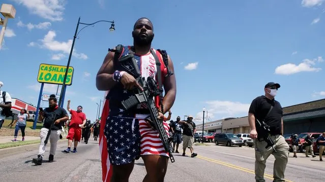 Black gun owners take part in a rally in support of the second amendment in Oklahoma City, Oklahoma, U.S., June 20, 2020. (Photo by Lawrence Bryant/Reuters)