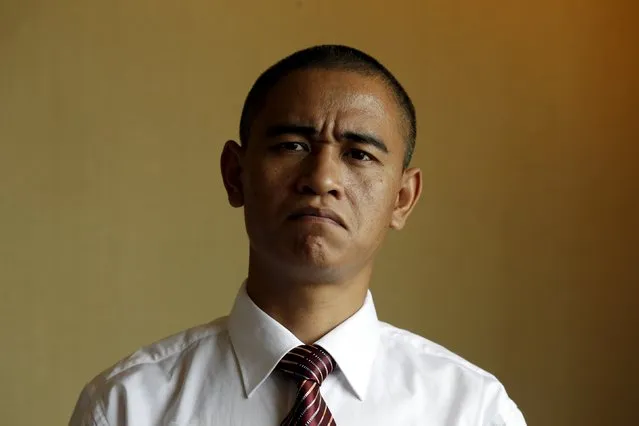 Xiao Jiguo, a 29-year-old actor from China's Sichuan province, impersonates U.S. President Barack Obama, in a hotel room in the southern Chinese city of Guangzhou September 17, 2015. (Photo by Bobby Yip/Reuters)