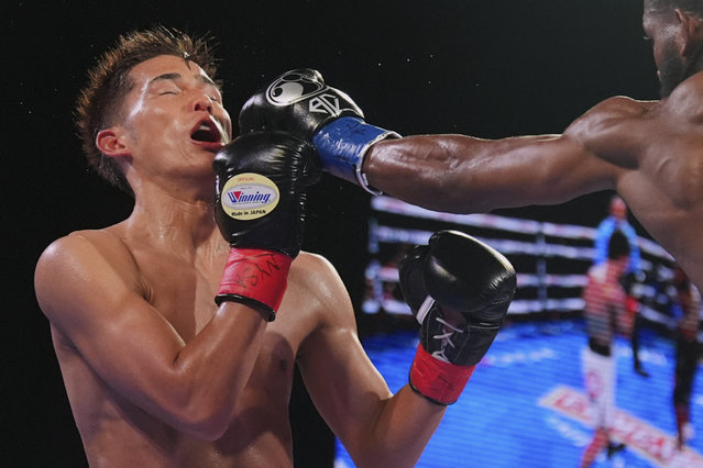 Cuba's Andy Cruz, right, punches Japan's Hironori Mishiro during the fourth round of a lightweight boxing match Saturday, June 14, 2025, in New York. (Photo by Frank Franklin II/AP Photo)