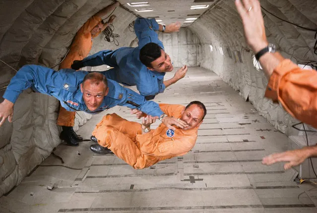 Astronauts Ted Freeman, Buzz Aldrin (centre), and Charlie Bassett experience zero gravity during a simulation flight in 1964. Nasa used a stripped down KC135 aircraft, affectionately known as the Vomit Comet, that was flown in a series of parabolas to give the astronauts about 30 seconds of either zero-G 1/6th-G near the top of each arc. (Photo by Ralph Morse/Time & Life Pictures/Getty Images/Taschen)
