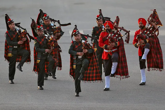 Members of the Indian military band take part in the Beating the Retreat ceremony in New Delhi, January 29, 2018. (Photo by Cathal McNaughton/Reuters)