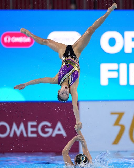 Team Japan compete in the team free final of artistic swimming at the World Aquatics Championships in Singapore, Sunday, July 20, 2025. (Photo by Vincent Thian/AP Photo)