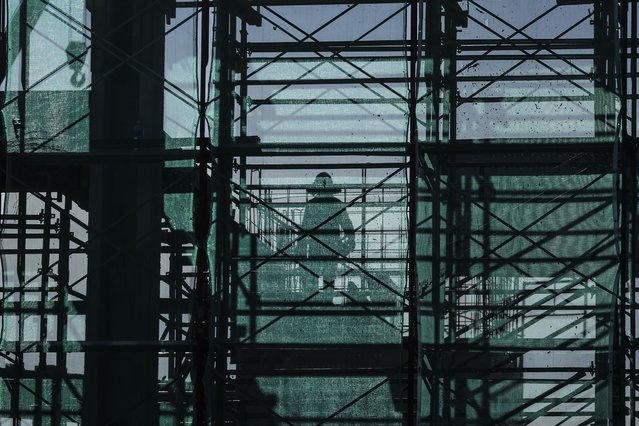 A man works at a construction site in Puncak Alam, outside Kuala Lumpur, Malaysia, 11 June 2025. 'The unemployment rate in Malaysia dropped to 3.0 percent in April 2025 from 3.3 percent in the same month of the previous year, marking the lowest level since April 2015, according to the latest data released by the Department of Statistics Malaysia. The number of unemployed persons shrank 5.5 percent year-on-year to a more than five-year low of 525.9 thousand, while employment increased by 2.8 percent to a record high of 16.82 million. (Photo by Fazry Ismail/EPA)