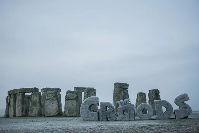 19th March 2013: In celebration of the Spring Solstice 2013 and in conjunction with the release of Twentieth Century Fox's 3D animation ‘THE CROODS’ - a family animation centered around the first ever pre historic road trip - a giant monument was erected at Stonehenge at sunrise today, Tuesday 19th March.  This marks the first time a modern structure has EVER been allowed on this historic site. The Spring Solstice or ‘Vernal Equinox’ recognises the first day of spring and each year sees druids and pagans gather at Stonehenge early in the morning to watch the sun rise above the prehistoric stones.  This year an additional monument, in the shape of ‘THE CROODS’, will become part of these special celebrations at daybreak. ‘Meet the first modern family, THE CROODS, whose world is rocked by generational clashes and seismic shifts that come to a head on a wild road trip filled with dazzling adventures, amazing firsts (like fire…and shoes), never before seen creatures and the epic discovery that they’ll have to stay one step ahead of the ever-changing world or get left in the prehistoric dust.’ DreamWorks Animation SKG presents THE CROODS. The film is directed by Chris Sanders & Kirk DeMicco, and produced by Kristine Belson and Jane Hartwell.  The screenplay is by Kirk DeMicco & Chris Sanders, with a story by John Cleese, Kirk DeMicco and Chris Sanders. The music is by Alan Silvestri. The film stars Nicolas Cage as Grug, Ryan Reynolds as Guy, Emma Stone as Eep, Catherine Keener as Ugga, Clark Duke as Thunk, and Cloris Leachman as Gran. THE CROODS presents an age known as the Croodaceous Period, which, says DeMicco, “fell between the Jurassic Age and the ‘Katzenzoic Era’– at least according to DreamWorks archaeologists.” It is a world of visual splendor and grandeur that holds innumerable challenges for the beleaguered clan