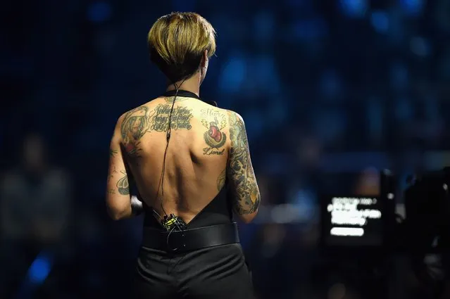 Co-host Ruby Rose back of tatoos is shown on stage during the MTV EMA's 2015 at the Mediolanum Forum on October 25, 2015 in Milan, Italy. (Photo by Brian Rasic/Getty Images for MTV)