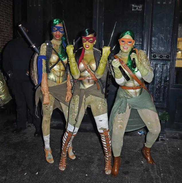 Singer Rihanna (C) as a Teenage Mutant Ninja Turtle is seen on October 31, 2014 in New York City. (Photo by NCP/Star Max/GC Images)