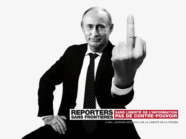Reporters Without Borders exposes montages of world leaders, including Mahmoud Ahmadinejad (Iran), Xi Jinping (China) and Bashar al-Assad (Syria) and Vladimir Putin (Russia) in Paris, marking the 20th World Day of Freedom Media. (Photo by Vincent Bousserez/Reporters Without Borders)