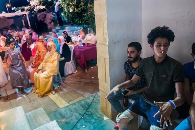 Guesmi at his sister’s wedding. “My family is so important to me”, he says. “It is a long road so I must be surrounded by good people who inspire me”. (Photo by Yassine Alaoui Ismaili/The Guardian)