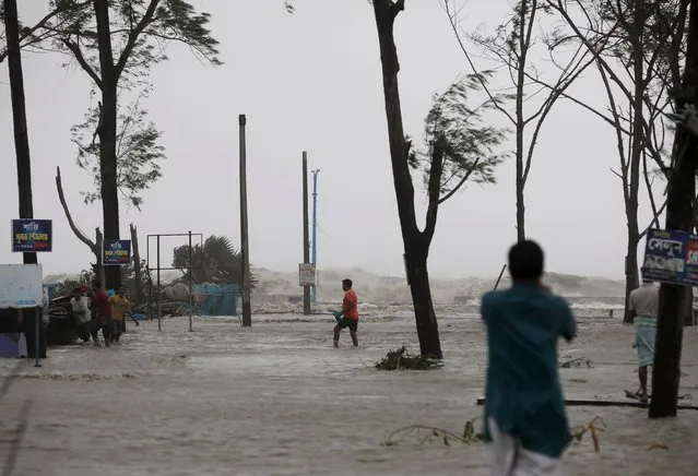 A flooded coastal area as Cyclone Yaas makes landfall in Digha, near the Bay of Bengal, south of Kolkata, India, 26 May 2021. The Odisha and Bengal governments started the evacuation of at-risk areas, as Cyclone Yaas hits the eastern coast of India. (Photo by Piyal Adhikary/EPA/EFE)