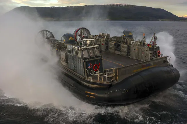 A handout photo made available by the US Navy on 02 November 2018 shows a landing craft, air cushion, assigned to Assault Craft Unit 4 (ACU 4) and attached to the San Antonio-class amphibious transport dock ship USS New York (LPD 21), transits in the Norwegian Sea on 01 November 2018. According to reports, some 50,000 participants from over 30 nations are expected to take part in the NATO-led military exercise in Norway from 25 October to 23 November 2018. (Photo by Petty Officer 2nd Class Lyle Wil/EPA-EFE)