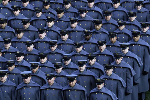 An Army cadet yawns after marching onto the field before an NCAA college football game against Navy, Saturday, December 8, 2018, in Philadelphia. (Photo by Matt Slocum/AP Photo)