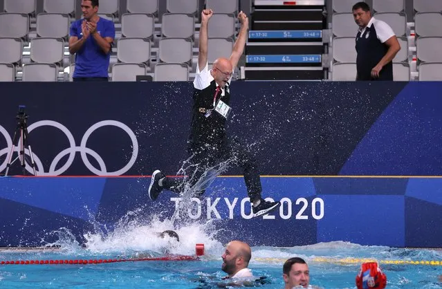 Members of the Serbian team celebrate a goal during the Tokyo 2020 Olympic Games men's water polo gold medal match between Greece and Serbia at the Tatsumi Water Polo Centre in Tokyo on August 8, 2021. (Photo by Gonzalo Fuentes/Reuters)