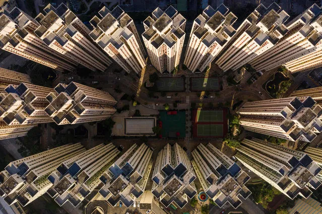 This aerial photo taken on December 21, 2018 shows a highrise residential housing estate in Hong Kong. (Photo by Dale De La Rey/AFP Photo)