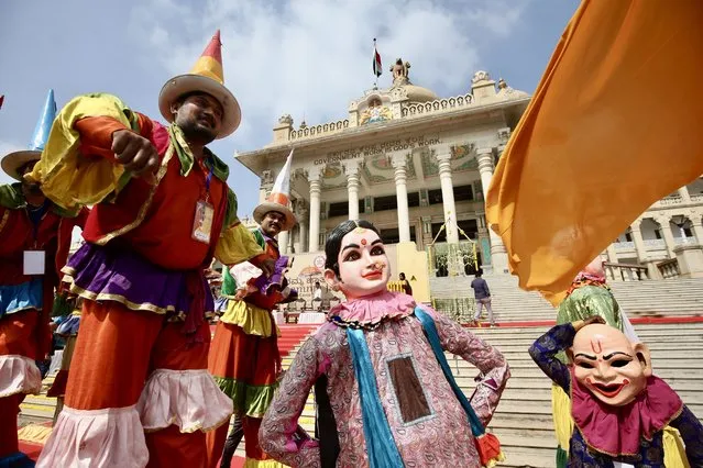 Indian folk artists perform during the “Unboxing Bengaluru Habba” or Bangalore festival, an annual citywide festival held in front of Vidhana Soudha, the State Legislature of Karnataka, in Bangalore, India, 10 December 2023. (Photo by Jagadeesh N.V./EPA)