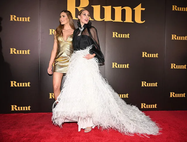 Cast member, American actress Nicole Elizabeth Berger (L) and fashion influencer Olivia Palermo attend the premiere of “Runt” at the TCL Chinese 6 Theater in Hollywood, California, September 22, 2021. (Photo by Robyn Beck/AFP Photo)