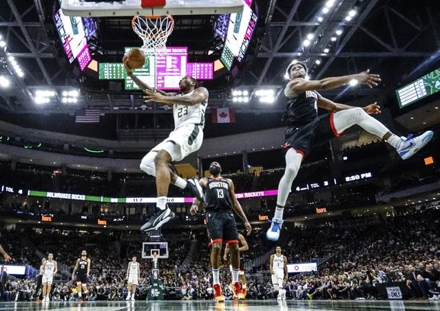 Milwaukee Bucks' Sterling Brown shoots past Houston Rockets' Danuel House Jr. during the second half of an NBA basketball game Tuesday, March 26, 2019, in Milwaukee. The Bucks won 108-94. (Photo by Morry Gash/AP Photo)