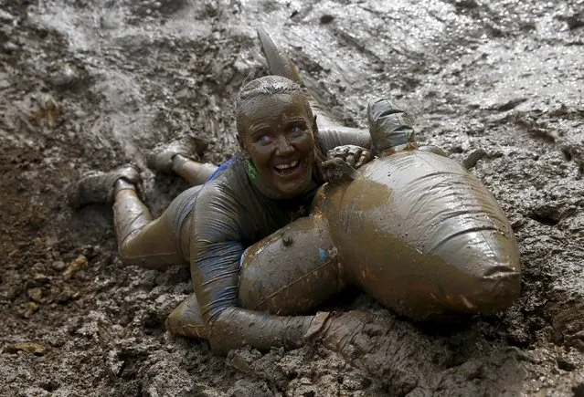 A competitor participates in the Tough Mudder challenge near Henley-on-Thames in southern England May 2, 2015. (Photo by Eddie Keogh/Reuters)
