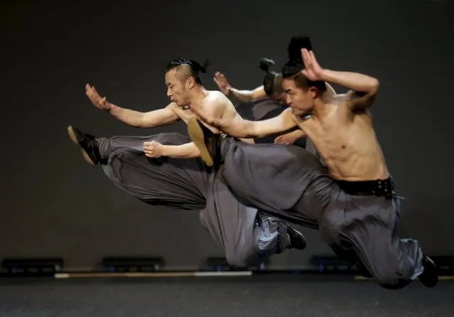 China's Contemporary Dragon Kungfu Company dancers with the show “Gateway” perform in Riga, Latvia, May 5, 2015. (Photo by Ints Kalnins/Reuters)