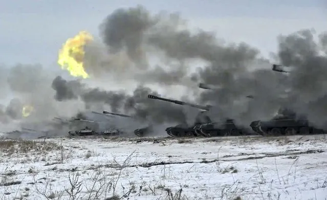 In this image taken from video and released by Russian Defense Ministry Press Service, Russian army's self-propelled howitzers fire during military drills near Orenburg in the Urals, Russia, Thursday, December 16, 2021. Russian troop buildup near Ukraine has drawn Ukrainian and Western concerns of a possible invasion but Moscow has denied planning to invade its neighbor. (Photo by Russian Defense Ministry Press Service via AP Photo)