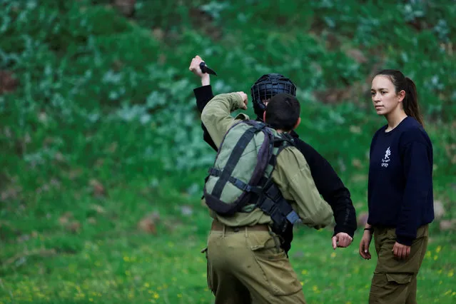 Female Israeli soldier, Lotem Stapleton (R), a physical education officer, oversees a training session in Krav Maga, an Israeli self-defence technique, at a military base in the Israeli-occupied Golan Heights March 1, 2017. (Photo by Nir Elias/Reuters)