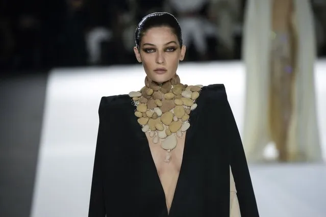 A model wears a creation for the Stephane Rolland Spring-Summer 2022 Haute Couture fashion collection, in Paris, Tuesday, January 25, 2022. (Photo by Francois Mori/AP Photo)