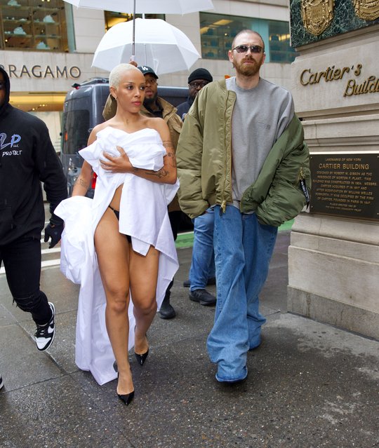 American rapper Doja Cat early May 2024 shocked onlookers as she arrived to Cartier for a shopping spree, sporting a painful looking hicky. She wrapped up in just a sheet as the new couple spent over an hour inside shopping. Pictured:Creative director of Vetements Guram Gvasalia and Doja Cat. (Photo by Splash News and Pictures)