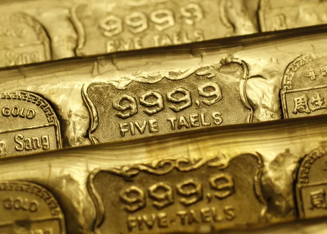 Five-tael (6.65 ounces or 190 grams) gold bars are seen at a jewellery store in Hong Kong in this August 11, 2011 illustration photo. (Photo by Bobby Yip/Reuters)