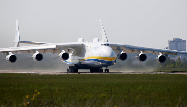 Antonov An-225 Mriya, a cargo plane which is the world's biggest aircraft, drives along an airfield starting its first commercial flight to the Australian city of Perth, in the settlement of Hostomel outside Kiev, Ukraine, May 10, 2016. (Photo by Valentyn Ogirenko/Reuters)