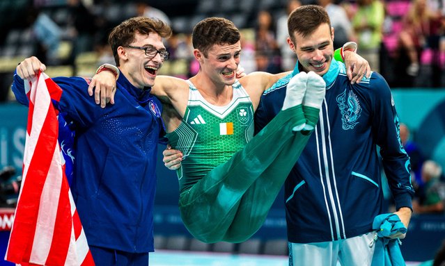 Bronze medalist Stephen Nedoroscik of Team United States, Gold medalist Rhys McClenaghan of Team Ireland and Silver medalist Nariman Kurbanov of Team Kazakhstan pose for a photo after competing during the Artistic Gymnastics Men's Pommel Horse Final on day eight of the Olympic Games Paris 2024 at Bercy Arena on August 03, 2024 in Paris, France. (Photo by Ed Alcock/The Observer)