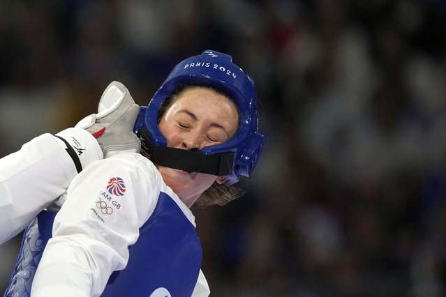 Britain's Jade Jones competes with North Macedonia's Miljana Reljikj in a women's 57kg Taekwondo match during the 2024 Summer Olympics, at the Grand Palais, Thursday, August 8, 2024, in Paris, France. (Photo by Andrew Medichini/AP Photo)