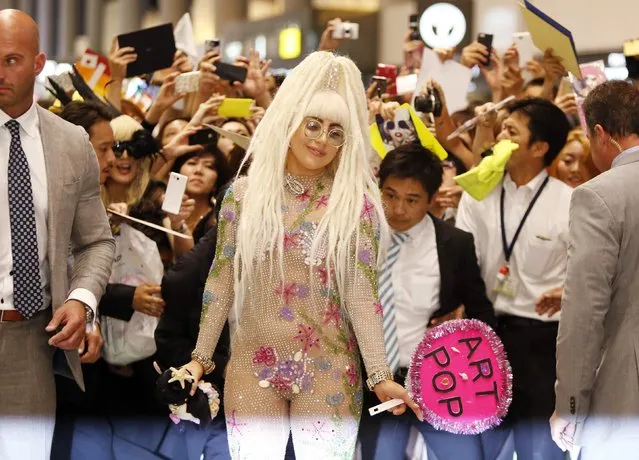 Singer Lady Gaga arrives at Narita international airport, east of Tokyo August 12, 2014. Lady Gaga flew into Japan on Tuesday as the first step of her “ArtRave: The Artpop Ball” Asian tour. (Photo by Yuya Shino/Reuters)