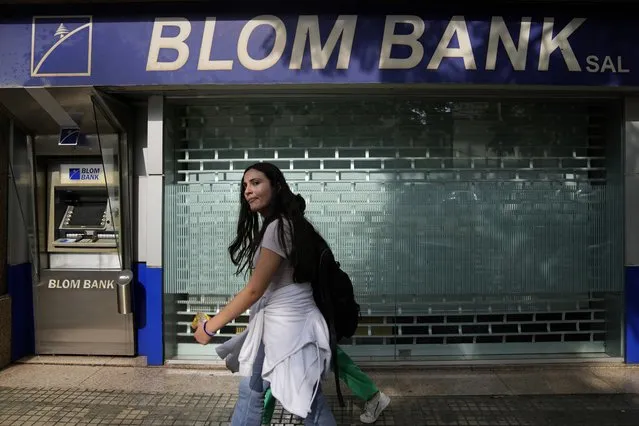 A BLOM Bank branch is shuttered and closed in Beirut, Lebanon, Tuesday, September 20, 2022. Lebanese banks closed their doors for three days on Sept. 19 to protest recent attacks and heists by depositors demanding their trapped savings. (Photo by Hassan Ammar/AP Photo)