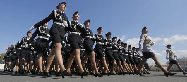 Russian Police academy female cadets march during a rehearsal for the Victory Day military parade at Dvortsovaya (Palace) Square in St Petersburg, Russia, Wednesday, May 7, 2014. (Photo by Dmitry Lovetsky/AP Photo)