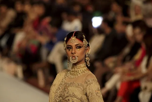 A model displays an outfit by Fahad Hussayn on the second day of PFDC (Pakistan Fashion Designers Council) Bridal Fashion week in Lahore, Pakistan, September 17, 2015. (Photo by Mohsin Raza/Reuters)
