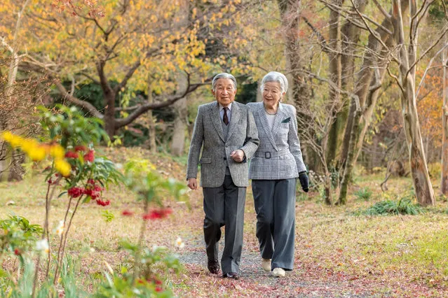 Japan's Emperor Akihito (L) and Empress Michiko take a stroll in the garden of the Imperial Residence at the Imperial Palace in Tokyo, Japan, in this handout picture taken December 6, 2017 and released by the Imperial Household Agency of Japan. Emperor Akihito celebrated his 84th birthday on December 23, 2017. (Photo by Reuters/Imperial Household Agency of Japan)