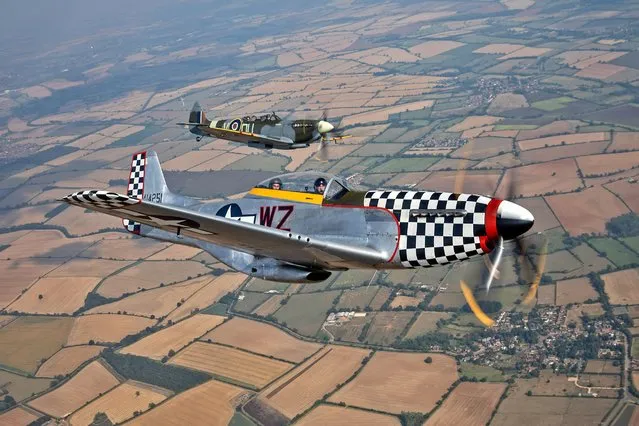 A British Spitfire and an American P-51 Mustang from Ultimate Warbird Flights take to the Northamptonshire on August 14, 2020 skies to mark the 75th anniversary of VJ Day. (Photo by Richard Pohle/The Times)