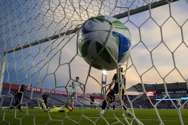 A shot by FC Dallas forward Logan Farrington, center, ripples the net during a home match against New York City FC on Friday, July 25, 2025. NYCFC would go on to win 4-3. (Photo by Julio Cortez/AP Photo)