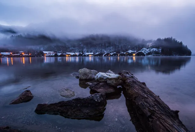 Schoenau am Koenigssee covered in a light fog ahead of sunrise in Bavaria, Germany, 25 January 2018. (Photo by Lino Mirgeler/DPA/Picture-Alliance/Barcroft Images)
