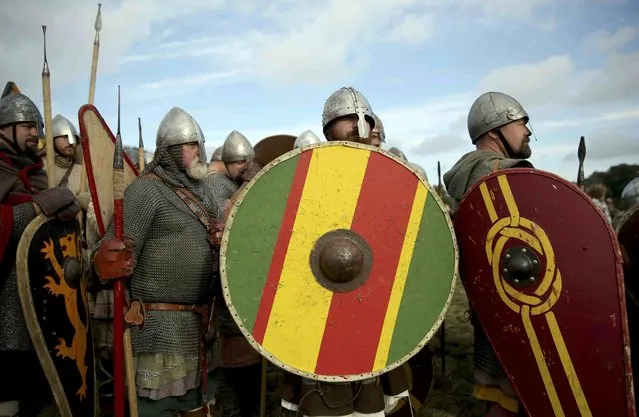 Re-enactors participate in a re-enactment of the Battle of Hastings, commemorating the 950th anniversary of the battle, in Battle, Britain October 15, 2016. (Photo by Neil Hall/Reuters)