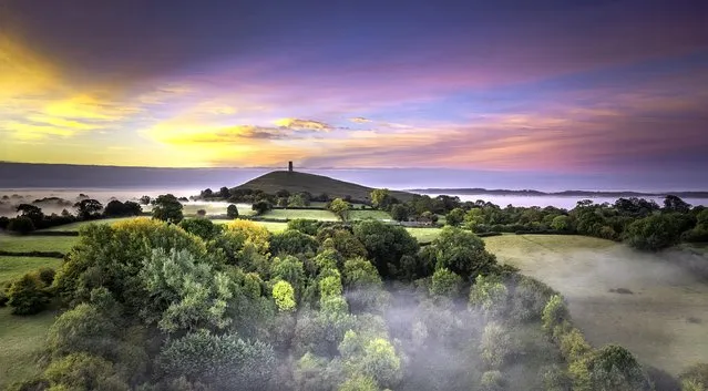 Sunrise on October 13, 2022 over Glastonbury Tor in Somerset, United Kingdom and a misty start to the day. (Photo by Mike Jefferies/pictureexclusive.com)