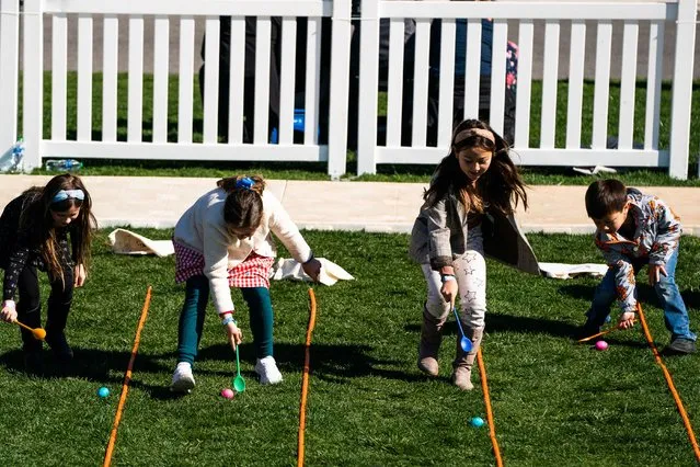 Guest participate during the 2023 White House Easter Egg Roll on the South Lawn of the White House on Monday, April 10, 2023. (Photo by Demetrius Freeman/The Washington Post)