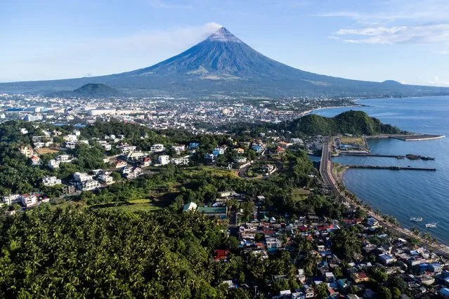Mayon volcano in Legazpi City, Albay province, the Philippines, on Saturday, June 17, 2023. The Philippines retained its economic growth forecast this year amid easing inflation, optimistic the Southeast Asian nation can withstand risks including a shaky global outlook. Photographer: (Photo by Lisa Marie David/Bloomberg)