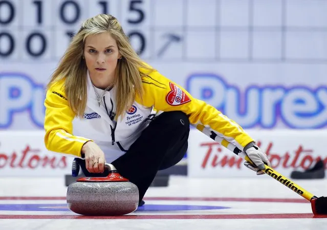 Manitoba skip Jennifer Jones delivers her shot during their curling game against Newfoundland and Labrador during the Scotties Tournament of Hearts in Moose Jaw, Saskatchewan, February 16, 2015. (Photo by Todd Korol/Reuters)