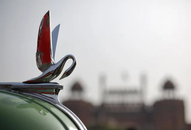 An emblem of a 1940 Buick car is pictured during a vintage car rally in front of the historic Red Fort in the old quarters of Delhi February 21, 2015. More than 200 vehicles took part in the vintage and classic car rally on Saturday. (Photo by Adnan Abidi/Reuters)