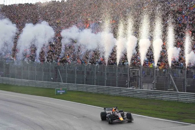 Red Bull driver Max Verstappen of the Netherlands celebrates after winning during the Formula One Dutch Grand Prix at the Zandvoort racetrack, in Zandvoort, Netherlands, Sunday, August 27, 2023. (Photo by Peter Dejong/AP Photo)