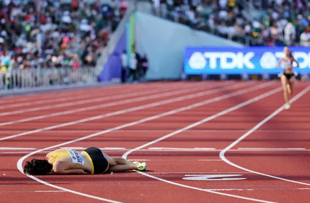Sara Benfares of Team Germany lays on the track following the the Women's 5000m heats on day six of the World Athletics Championships Oregon22 at Hayward Field on July 20, 2022 in Eugene, Oregon. (Photo by Lucy Nicholson/Reuters)
