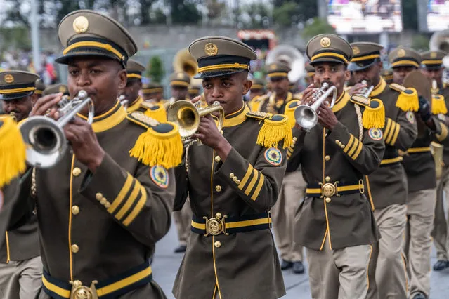 Members of the Republican Guard March Band play trumpets during the 116th celebration of Ethiopian Defense Force day in Addis Ababa, Ethiopia on October 26, 2023. (Photo by Amanuel Sileshi/AFP Photo)